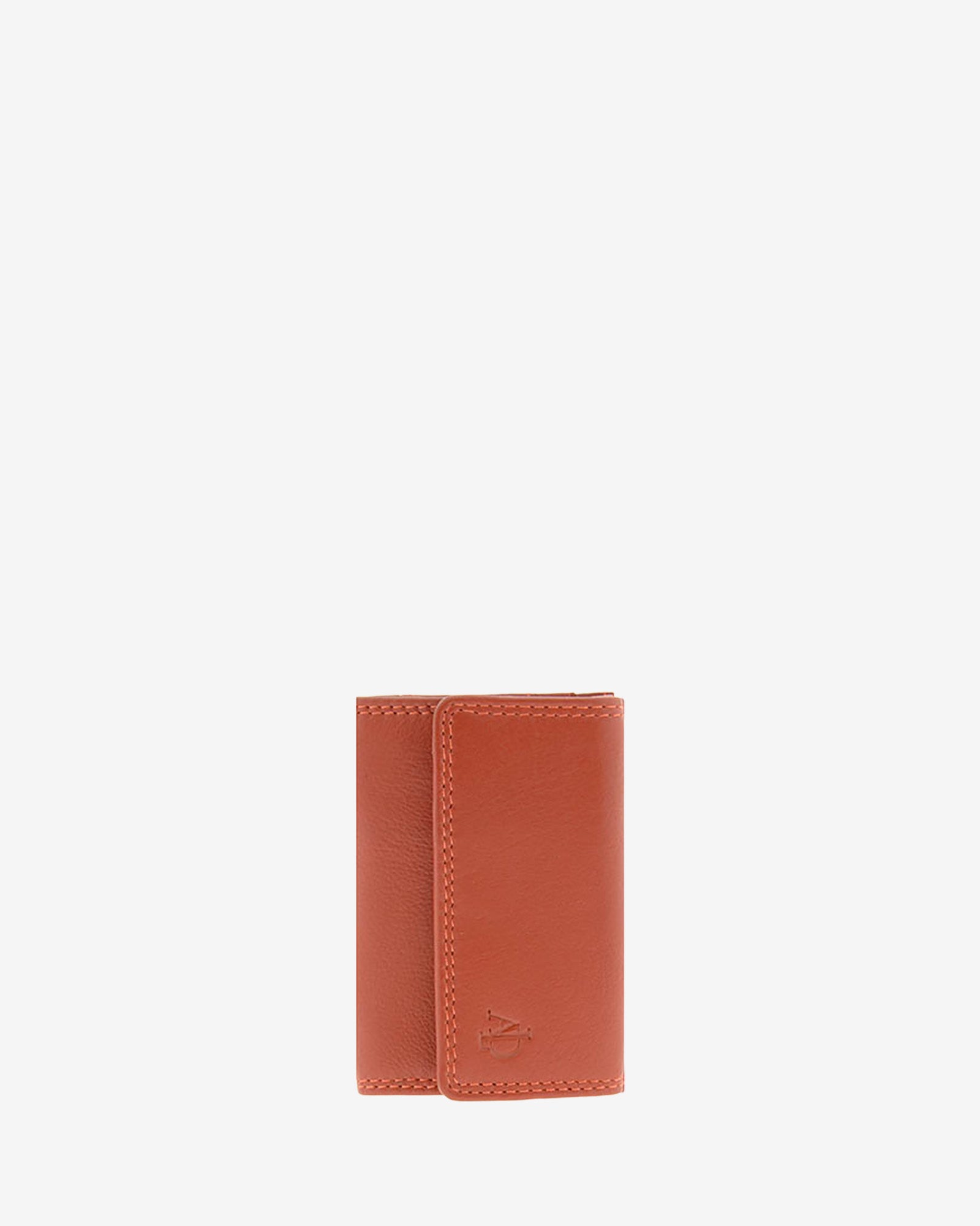 Básicos atemporales — Cartera pequeña con solapa