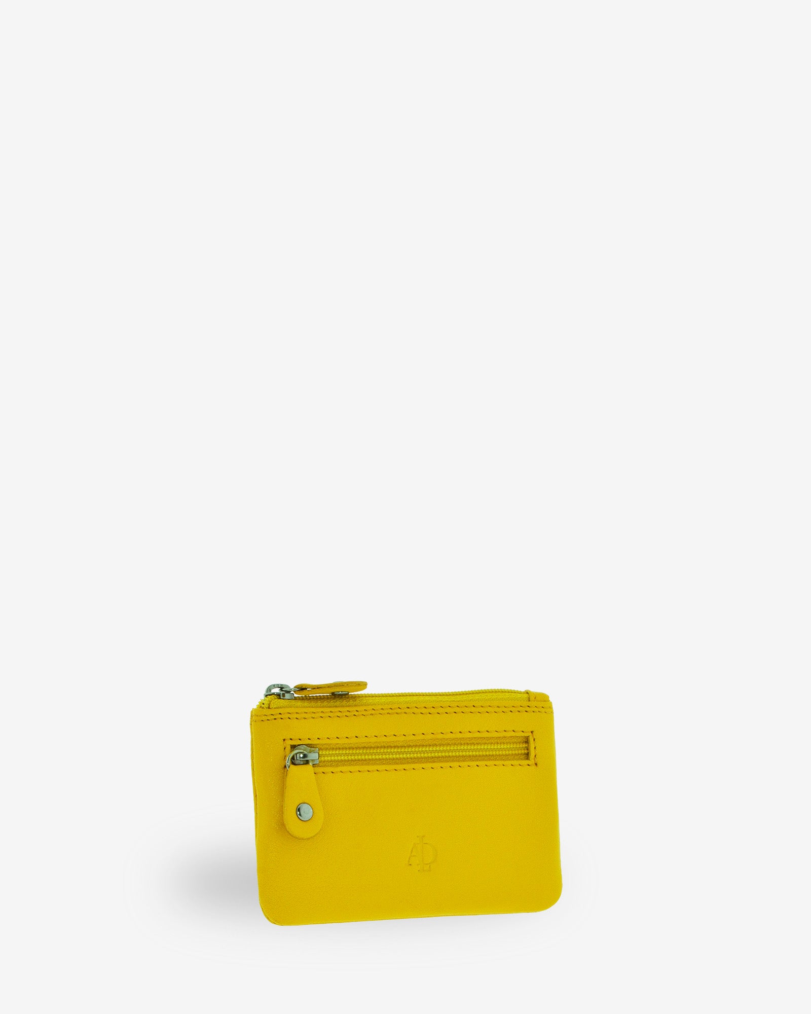 Monedero pequeño 8010 en color limón, vista tres cuartos frontal con bolsillo exterior de cremallera.