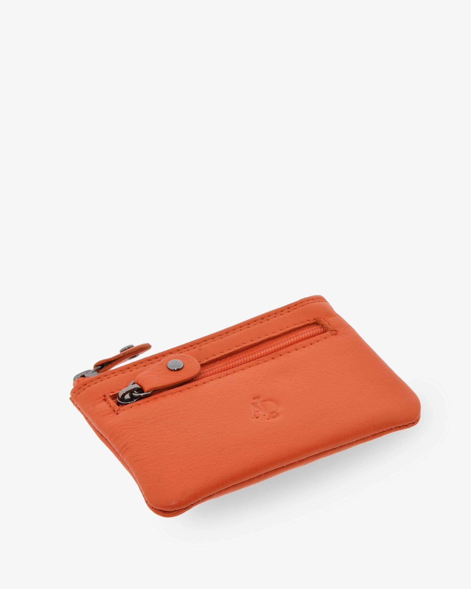 Monedero pequeño 8010 en color mandarina, visto desde arriba en tres cuartos con sus dos cremalleras.