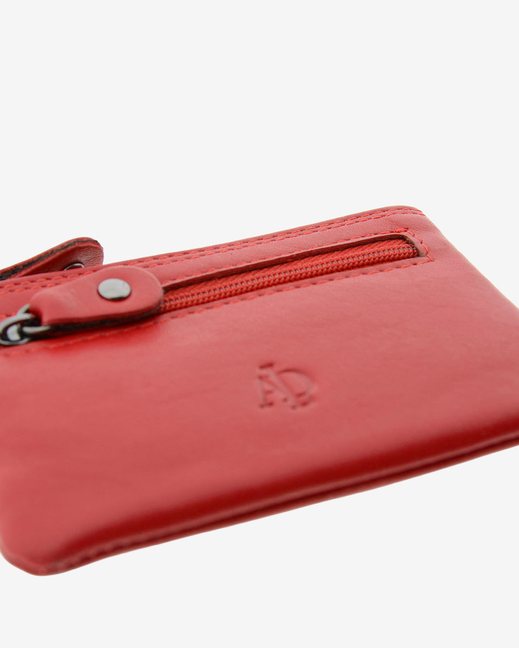 Monedero pequeño 8010 en color rojo, visto desde arriba en tres cuartos con sus dos cremalleras.