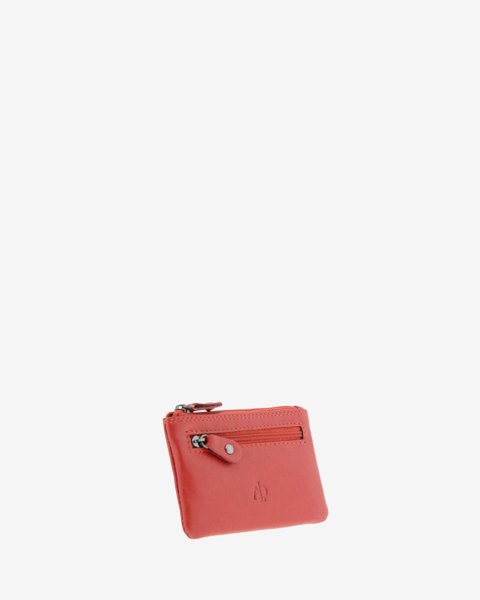 Monedero pequeño 8010 en color rojo, vista tres cuartos frontal izquierda con bolsillo exterior de cremallera.