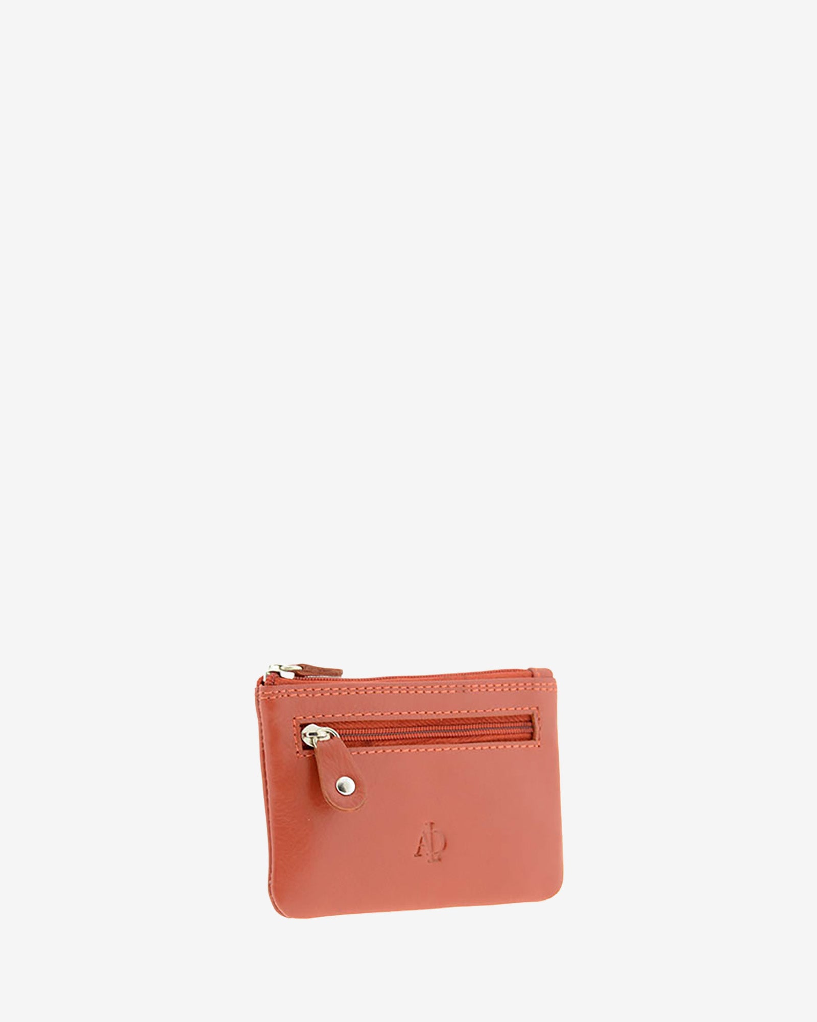 Monedero pequeño 8010 en color teja, vista tres cuartos frontal con bolsillo exterior de cremallera.