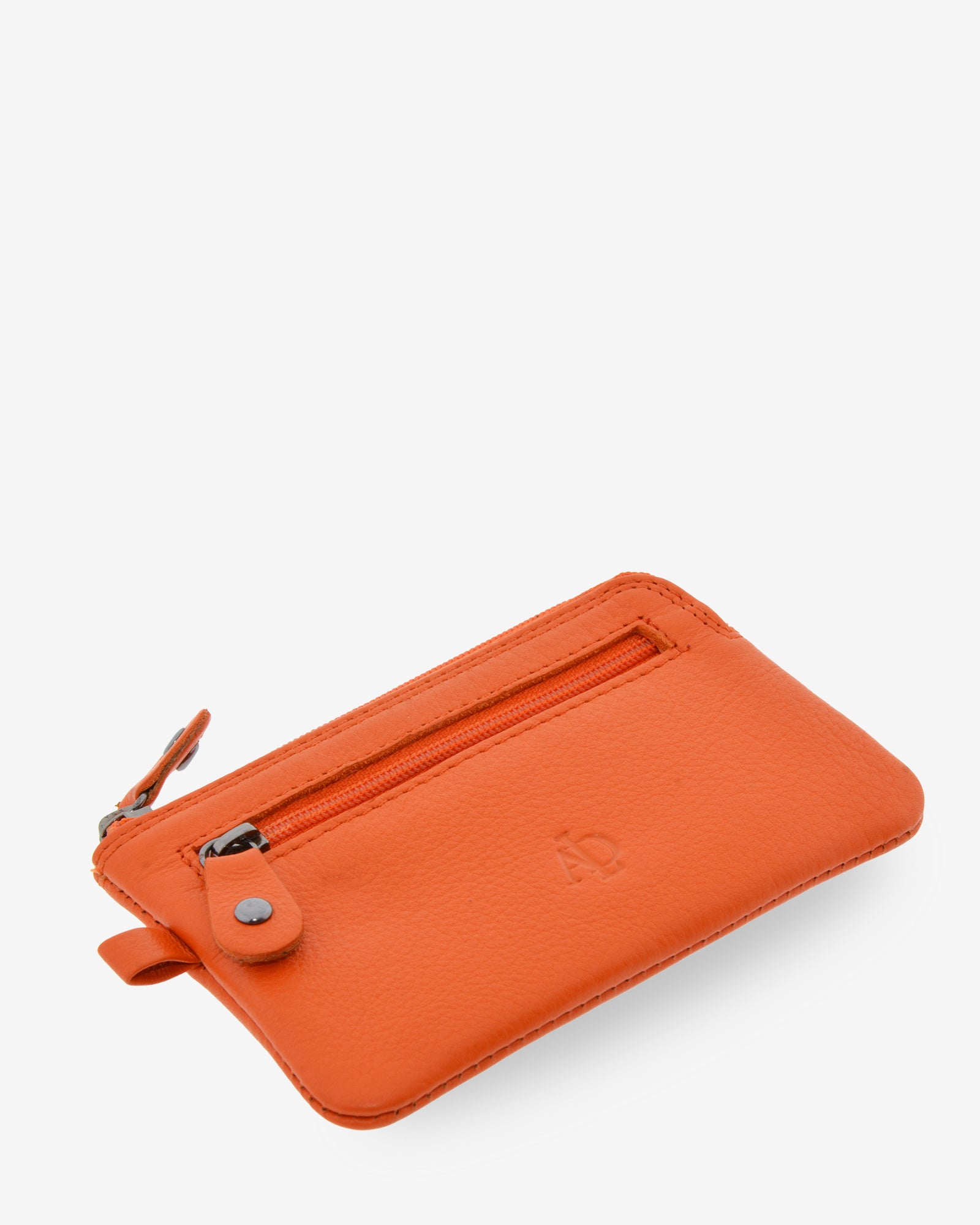 Monedero fino 8011 en color mandarina, visto desde arriba en tres cuartos con sus dos cremalleras.