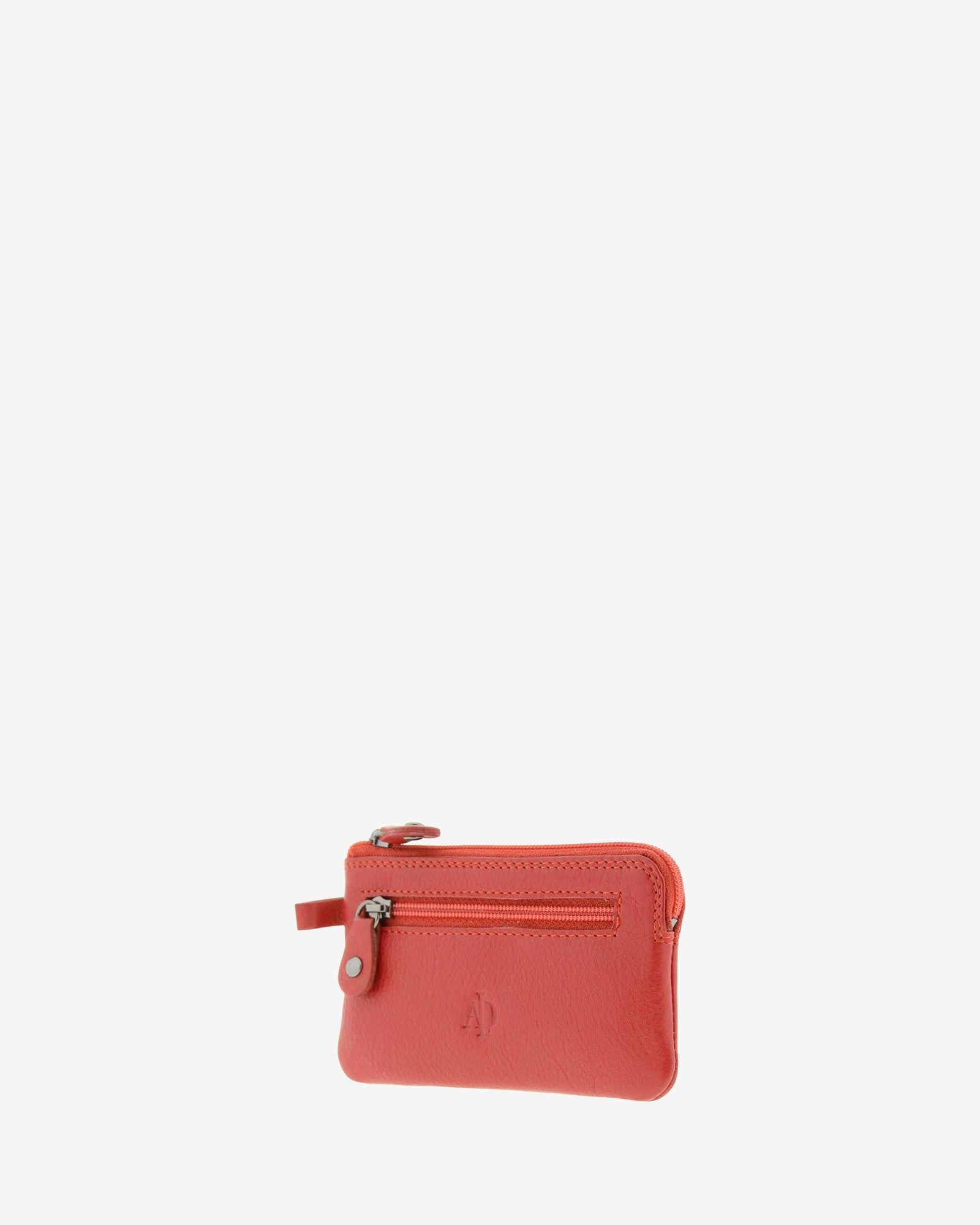 Monedero fino 8011 en color rojo, vista tres cuartos frontal derecha con bolsillo exterior de cremallera.