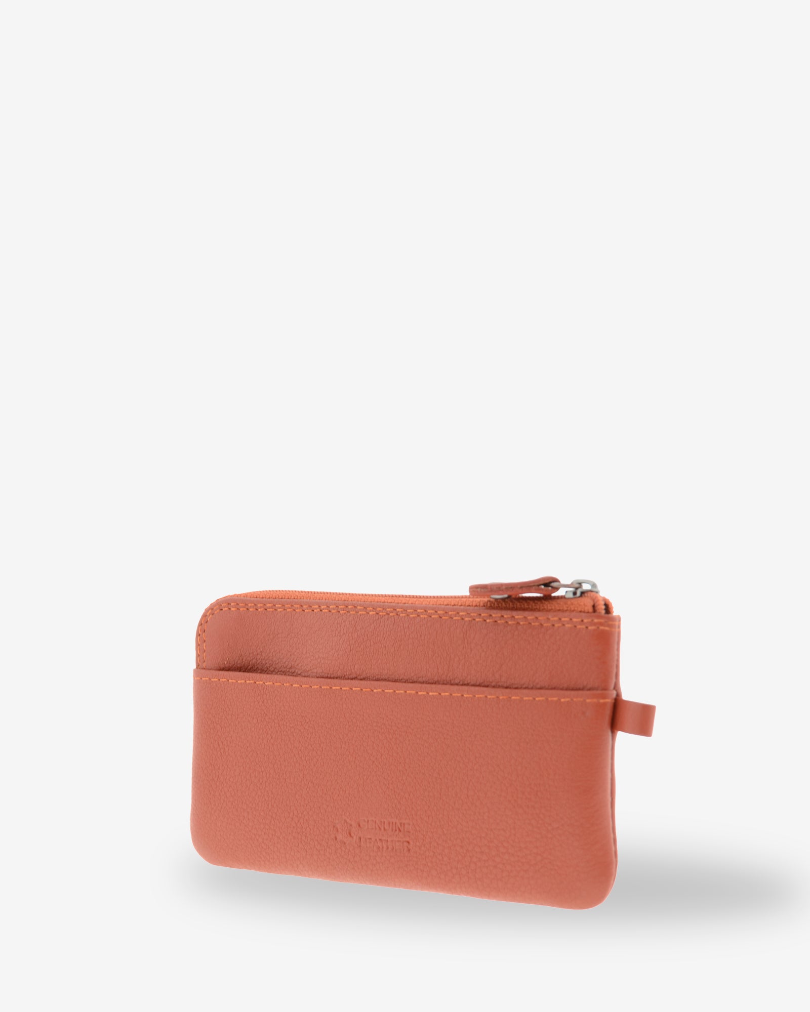 Monedero fino 8079 en color teja, vista tres cuartos posterior con ranura exterior.