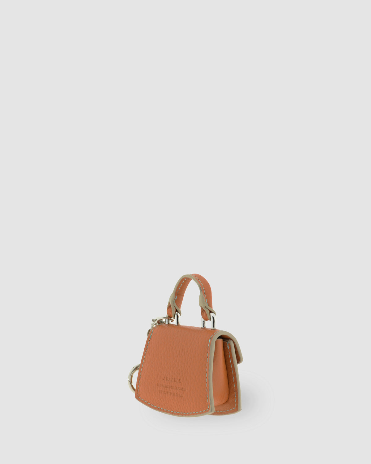 Charm para bolso con funda para auriculares Nexo 8099 miel, vista trasera lateral con cadena y anilla