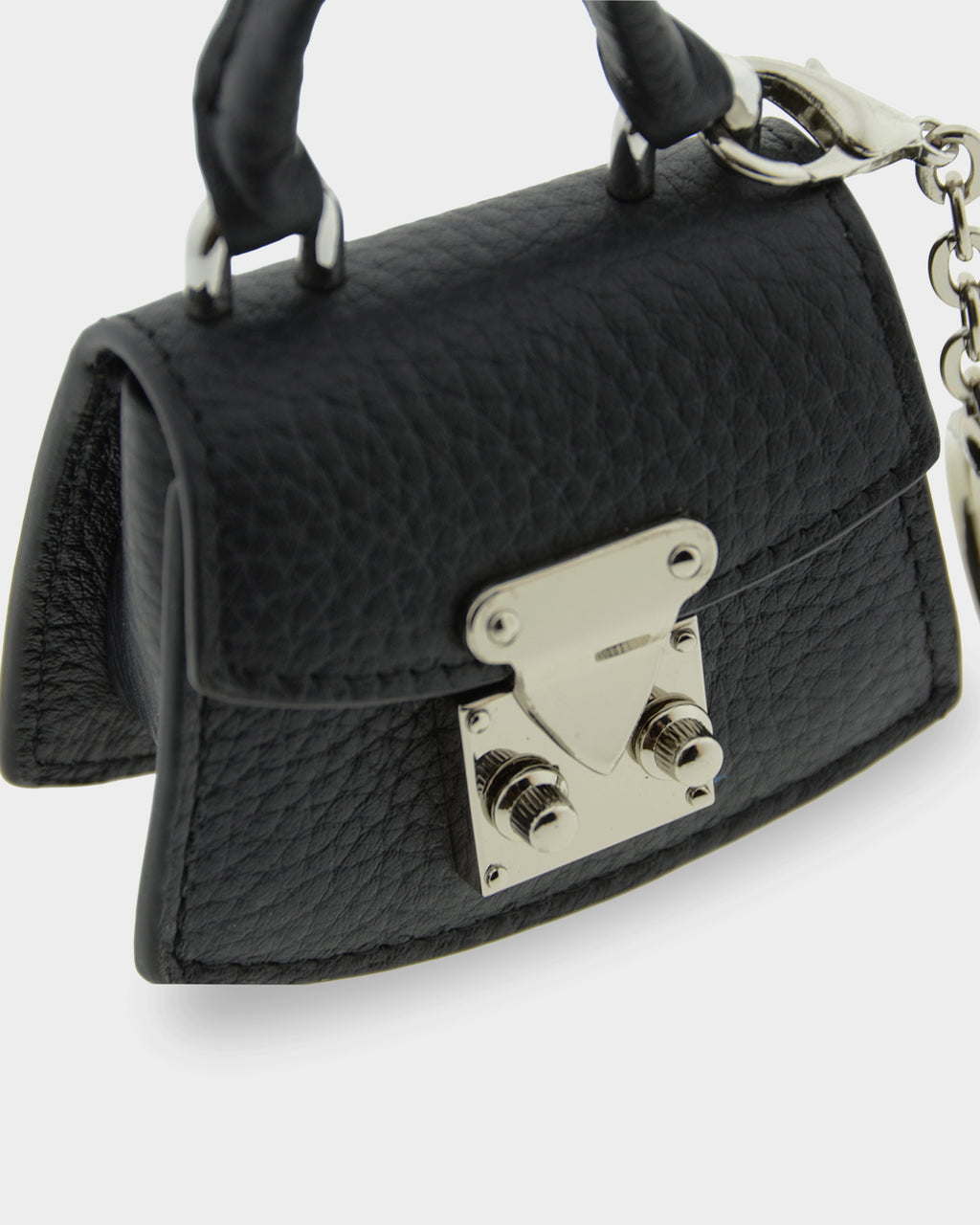 Detalle frontal del charm para bolso con funda para auriculares Nexo 8099 negro con solapa y cierre metálico