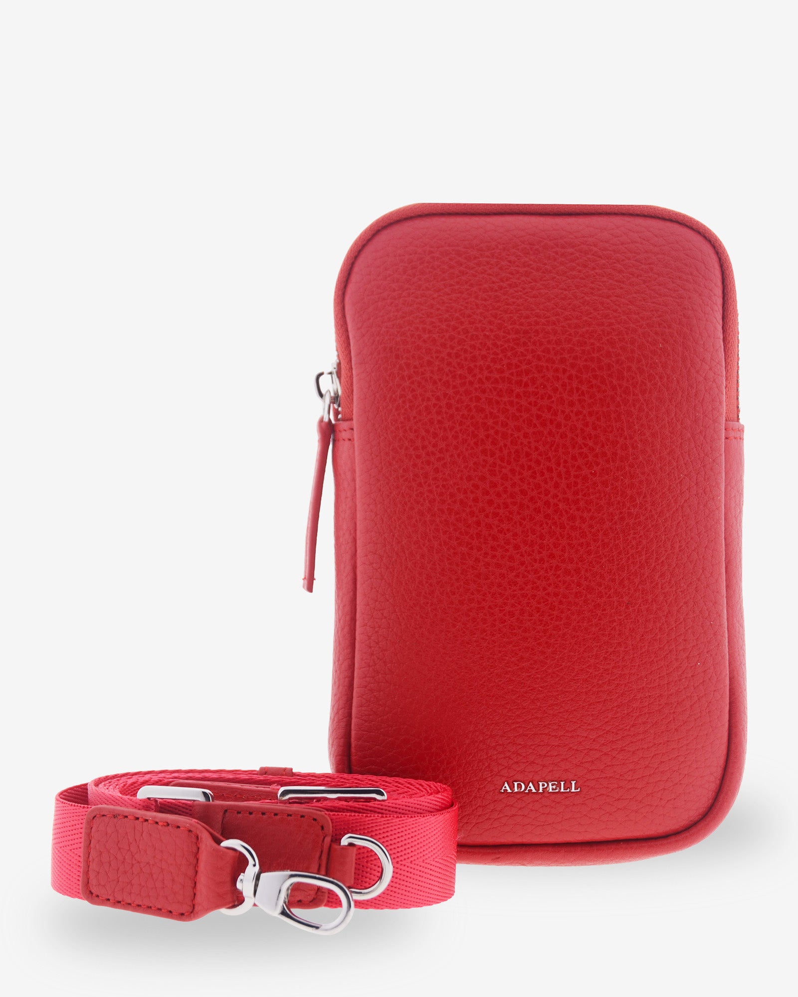 Bolso bandolera vertical Nexo en color amapola con bandolera textil regulable y desmontable