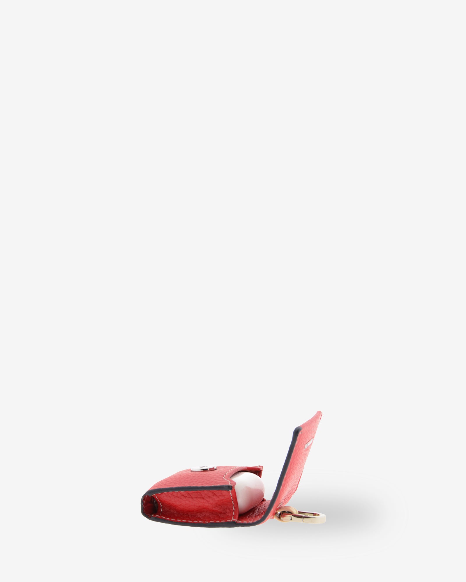Funda para auriculares Nexo 8093 amapola abierta con un estuche de carga de auriculares inalámbricos en el interior
