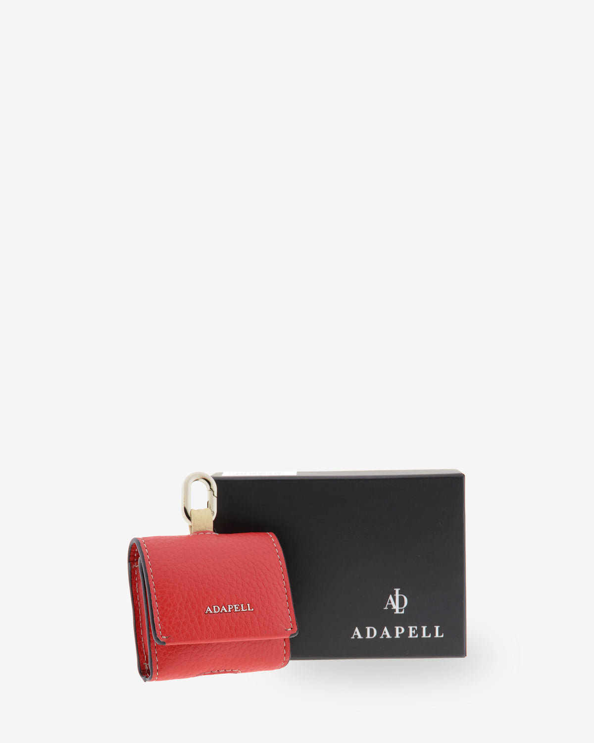 Funda para auriculares Nexo 8093 en color amapola junto a caja de presentación Adapell