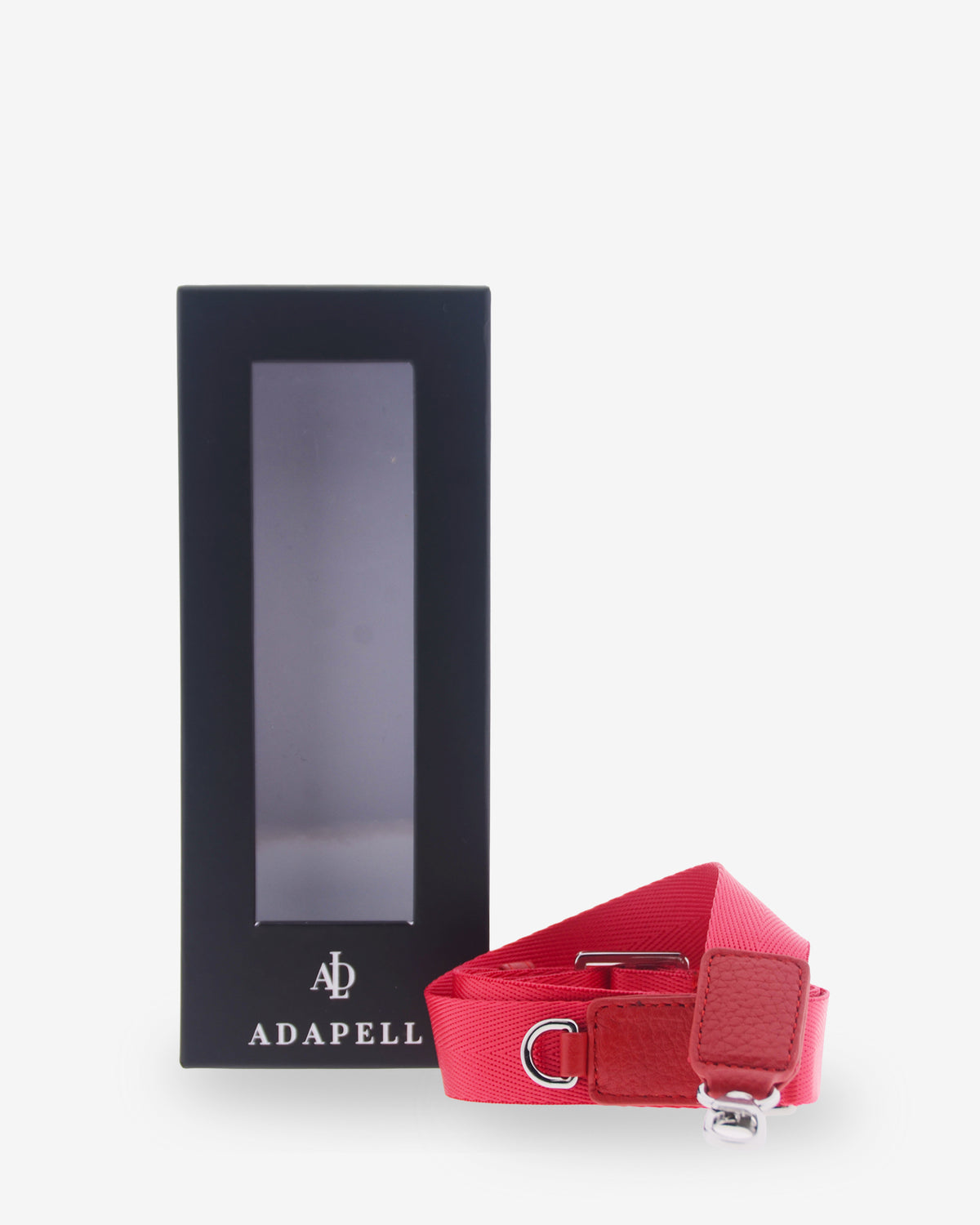 Lanyard Nexo ajustable para móvil en color miel recogido junto a la caja de regalo Adapell