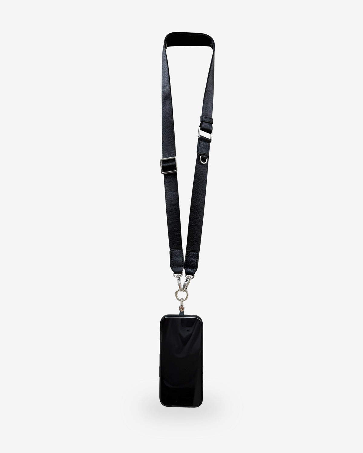 Lanyard Nexo ajustable para móvil en color negro, con correa de nylon y detalles de piel de vacuno
