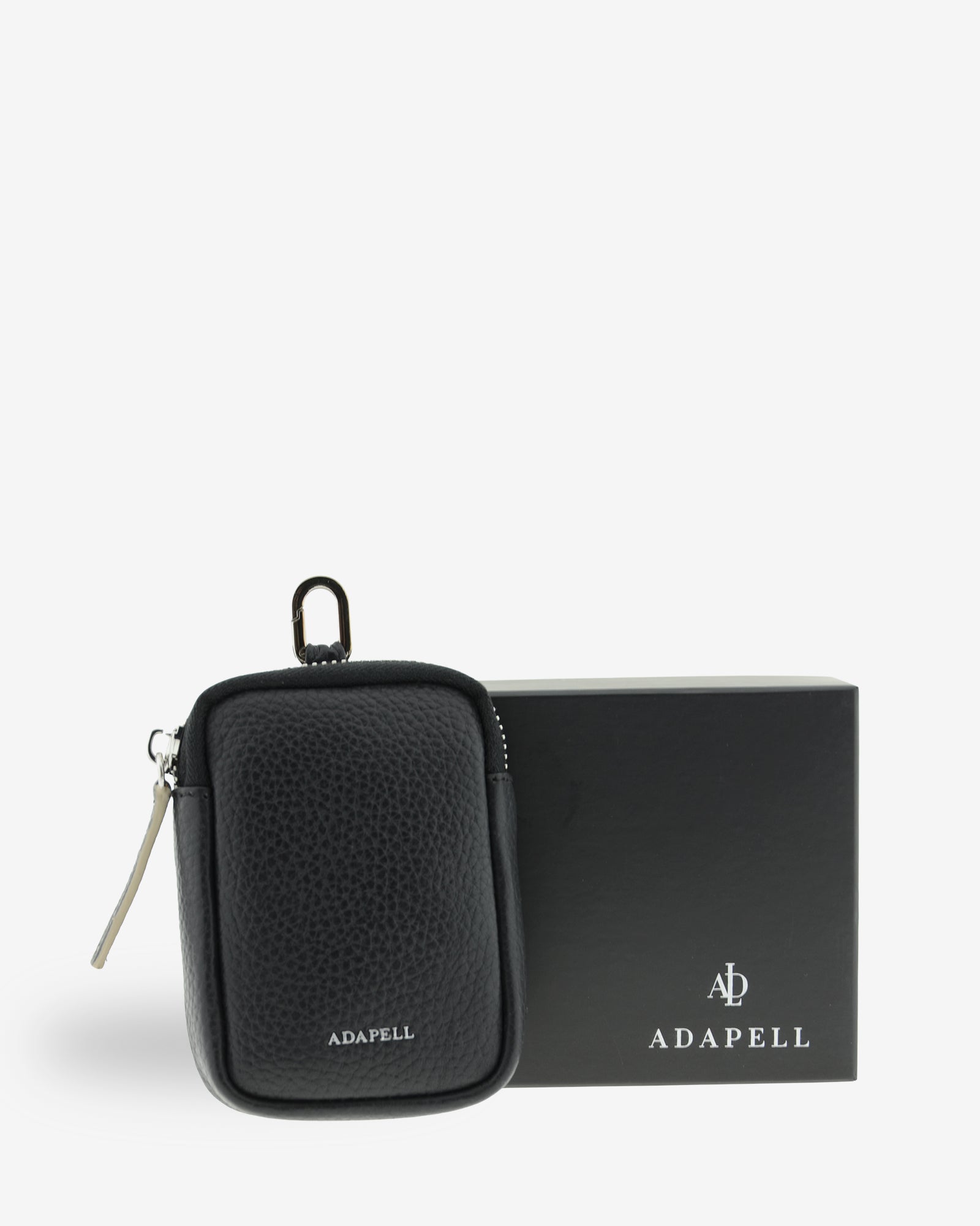 Monedero tarjetero Nexo 8096 en color negro junto a caja de presentación Adapell