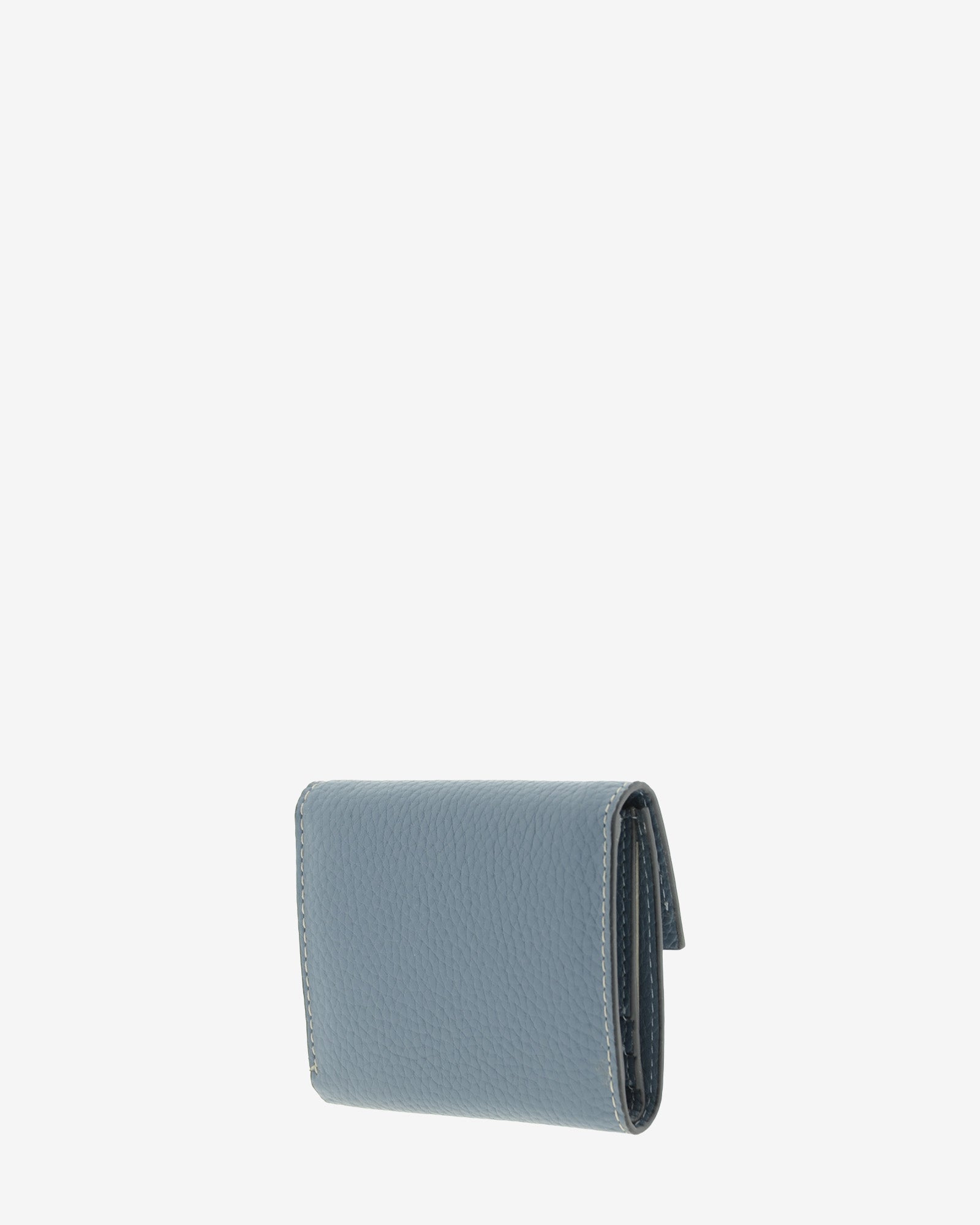 Cartera pequeña Nude 4256 en color Azul piedra, vista trasera en tres cuartos mostrando el perfil y la piel granulada.