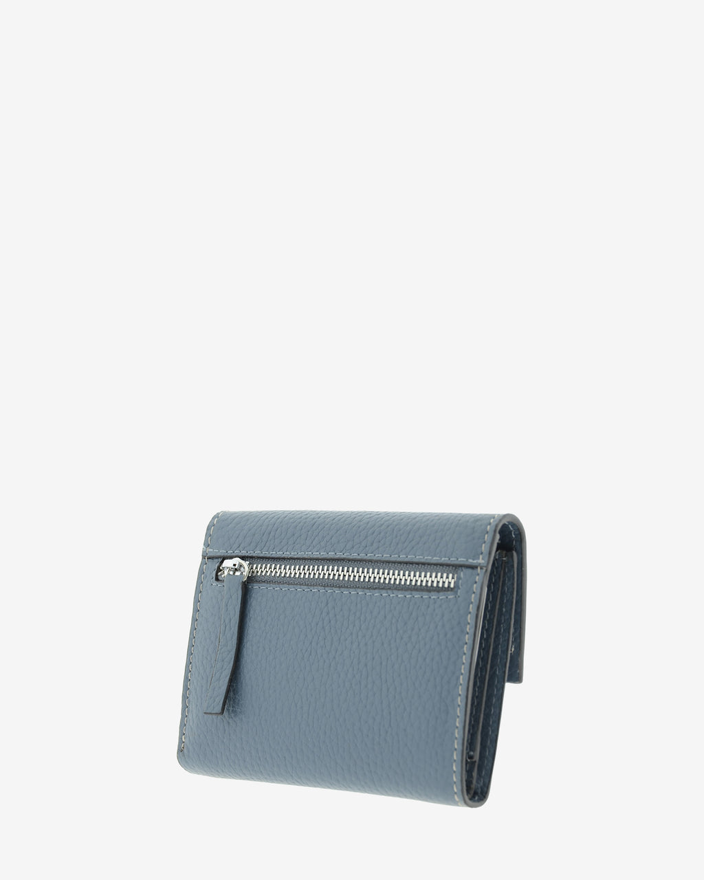 Cartera pequeña de mujer Nude en color Azul piedra, vista trasera en tres cuartos con compartimento exterior con cremallera.