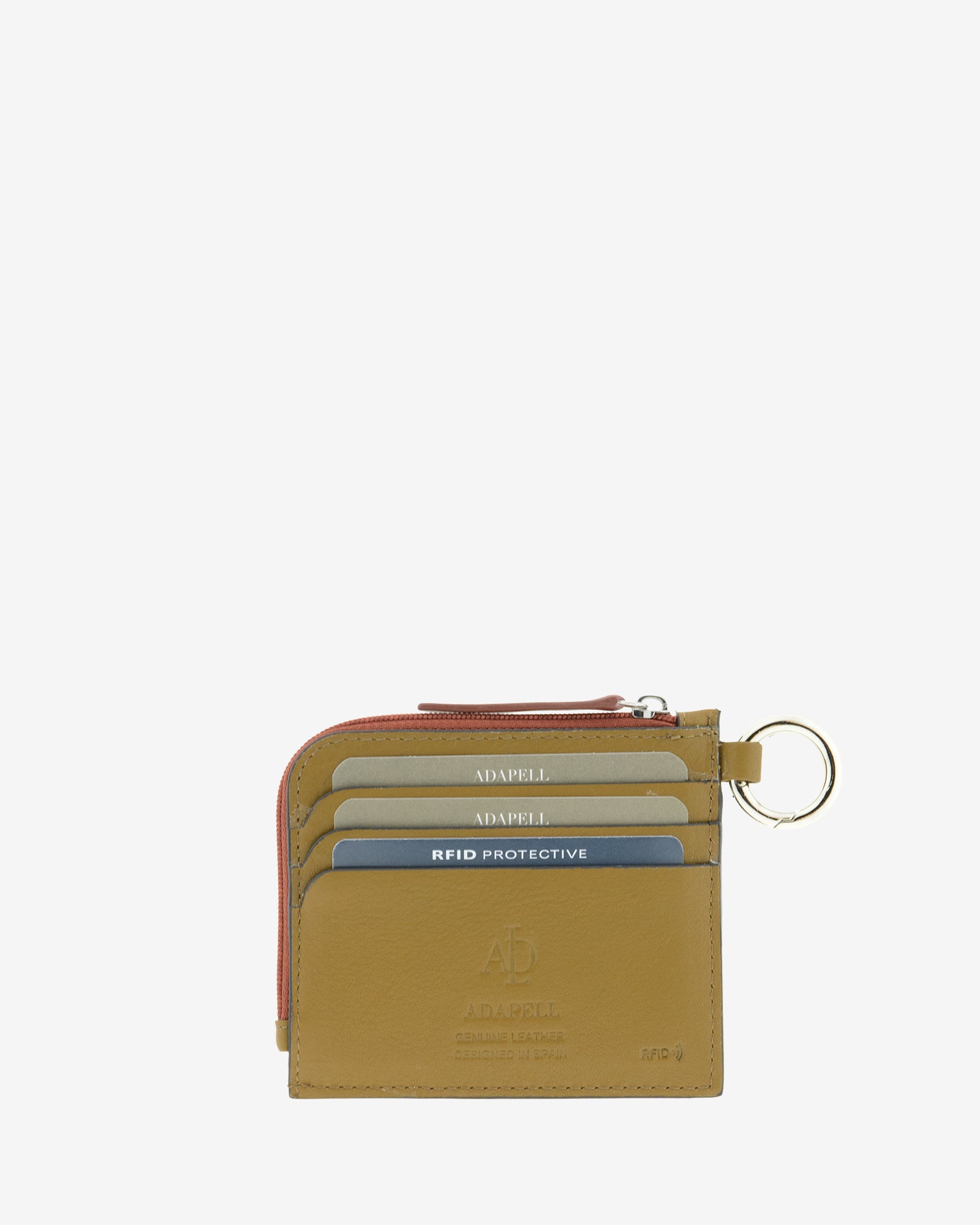 Tarjetero/monedero de piel auténtica ref. 425 en color marrón ámbar ébano, de medida compacta, cierre de cremallera central y aro metálico exterior, con protección de tarjetas RFID de la colección Brisa, vista trasera