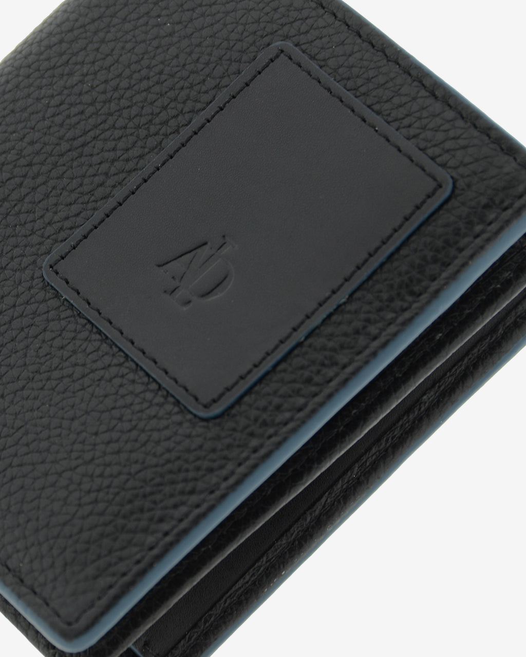 Detalle de logo, textura de piel y ribete en cartera negra con RFID y monedero, ref. 1661-1