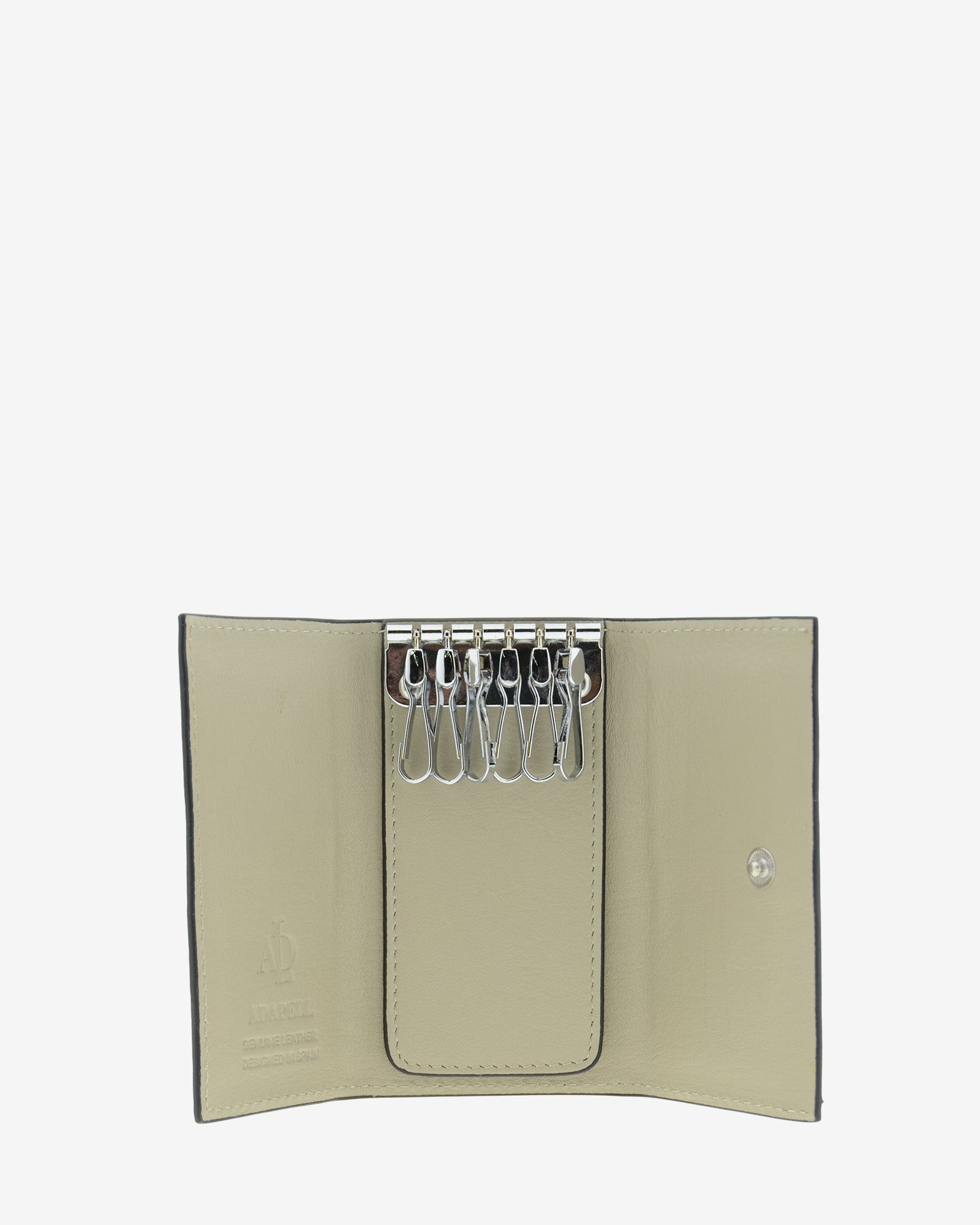 Llavero en piel auténtica de color ice stone, ref. 8084-12 y bordes en negro, con interior de piel, mosquetón para 6 llaves y exterior con compartimento para tarjeta, vista interior