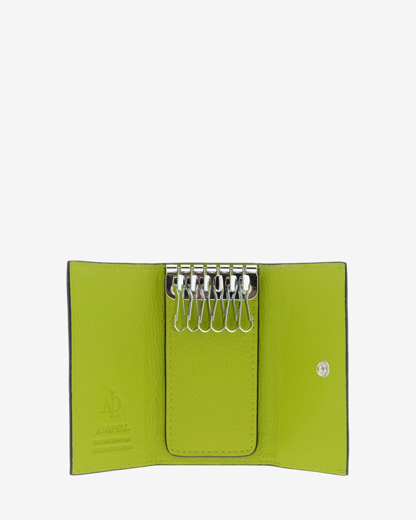 Llavero en piel auténtica de color lima y bordes en negro, ref. 8084-17, exterior e  interior de piel, mosquetón para 6 llaves y  compartimento exterior trasero para tarjeta, vista interior