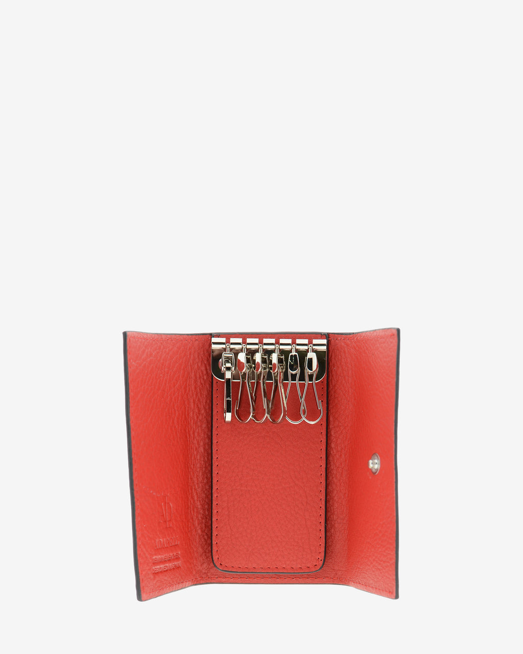 Llavero en piel auténtica de color rojo y bordes en negro, con interior de mosquetón para 6 llaves y exterior con compartimento para tarjeta, vista interior