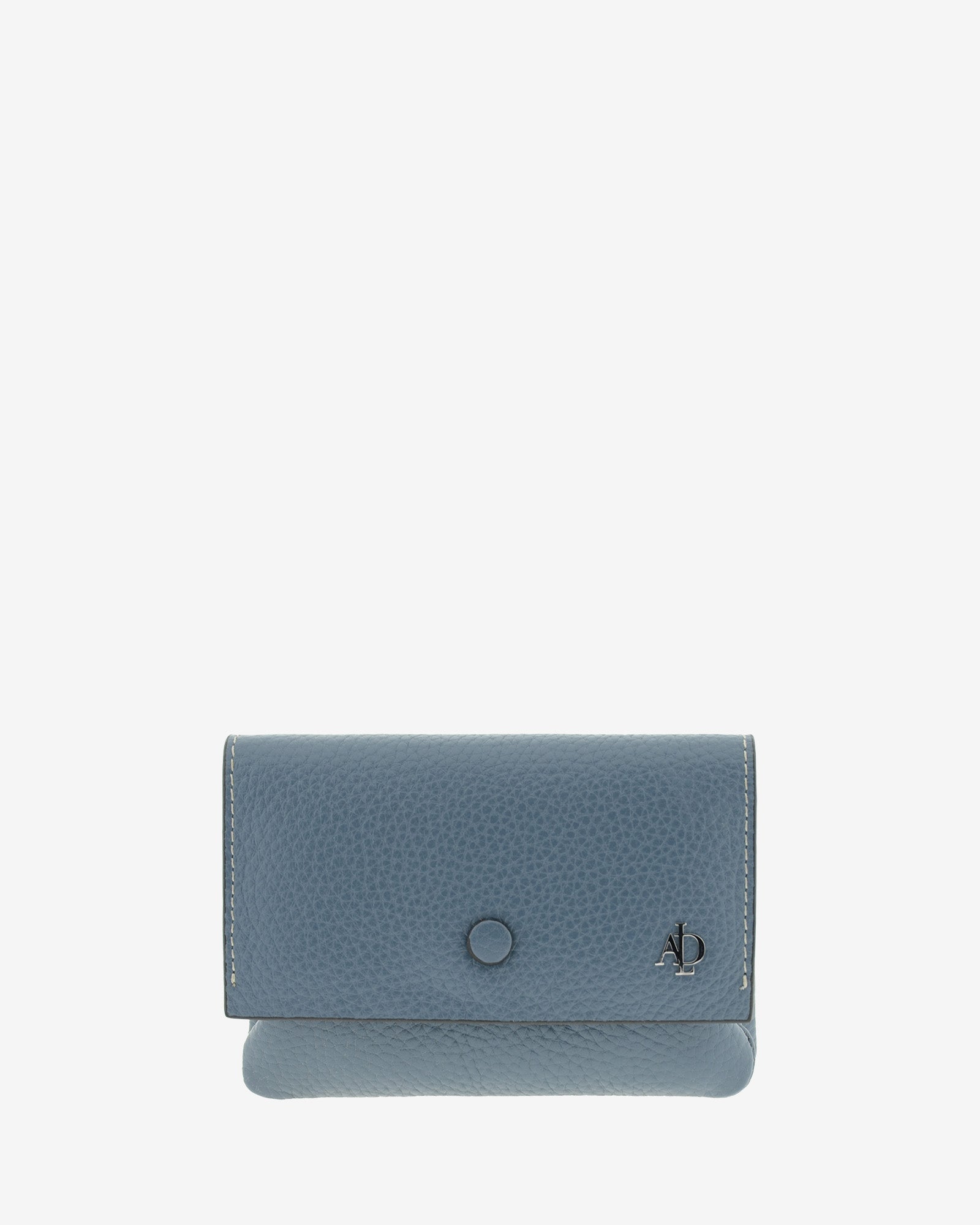 Monedero de mujer en piel auténtica granulada de color azul blue stone, con boquilla interior y protección de tarjetas RFID. De la colección Nude, vista frontal.