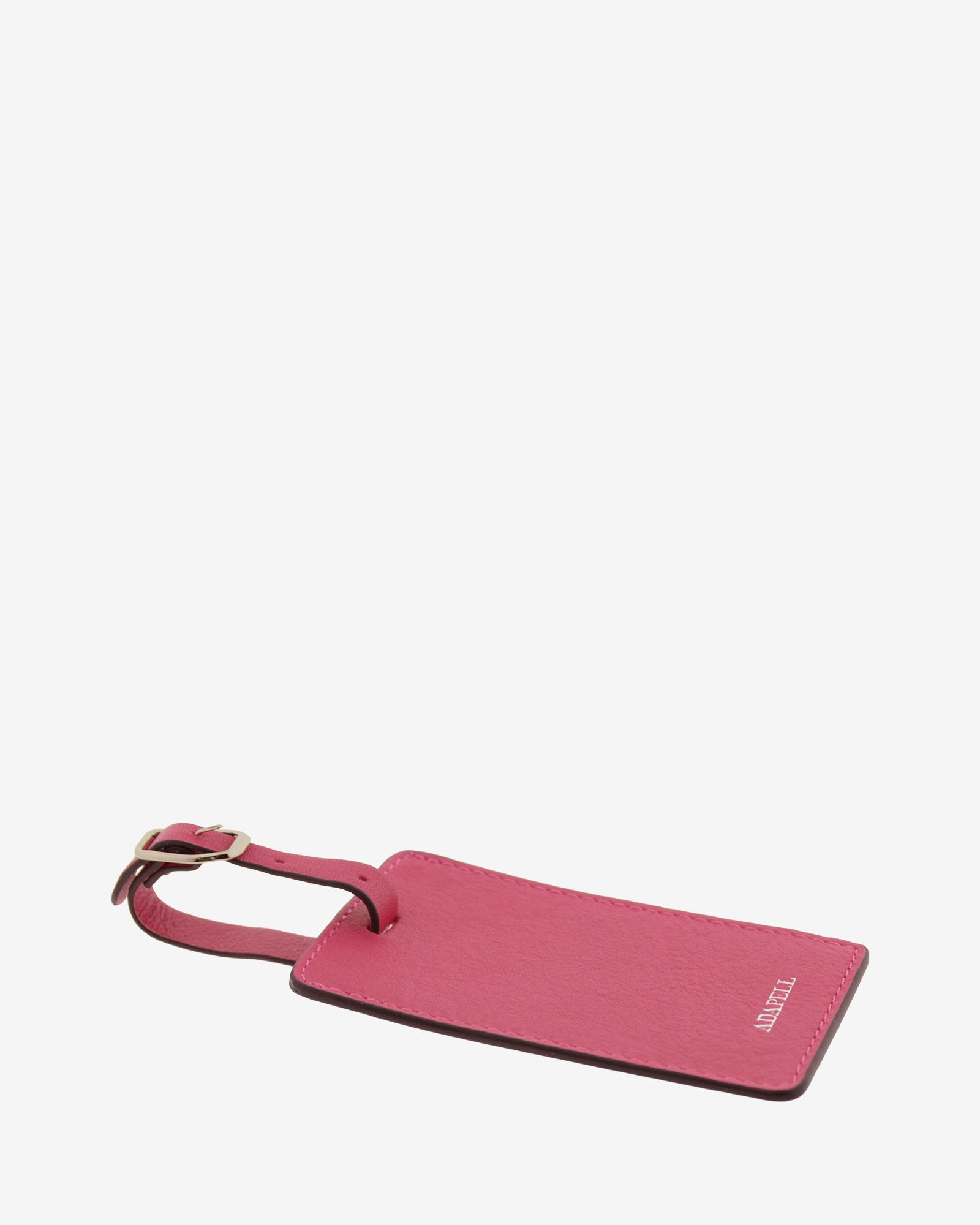 Tag identificador maleta con cierre de hebilla, ref. 8088-25, en piel de color fucsia y cantos en negro, con logo Adapell, vista tumbada